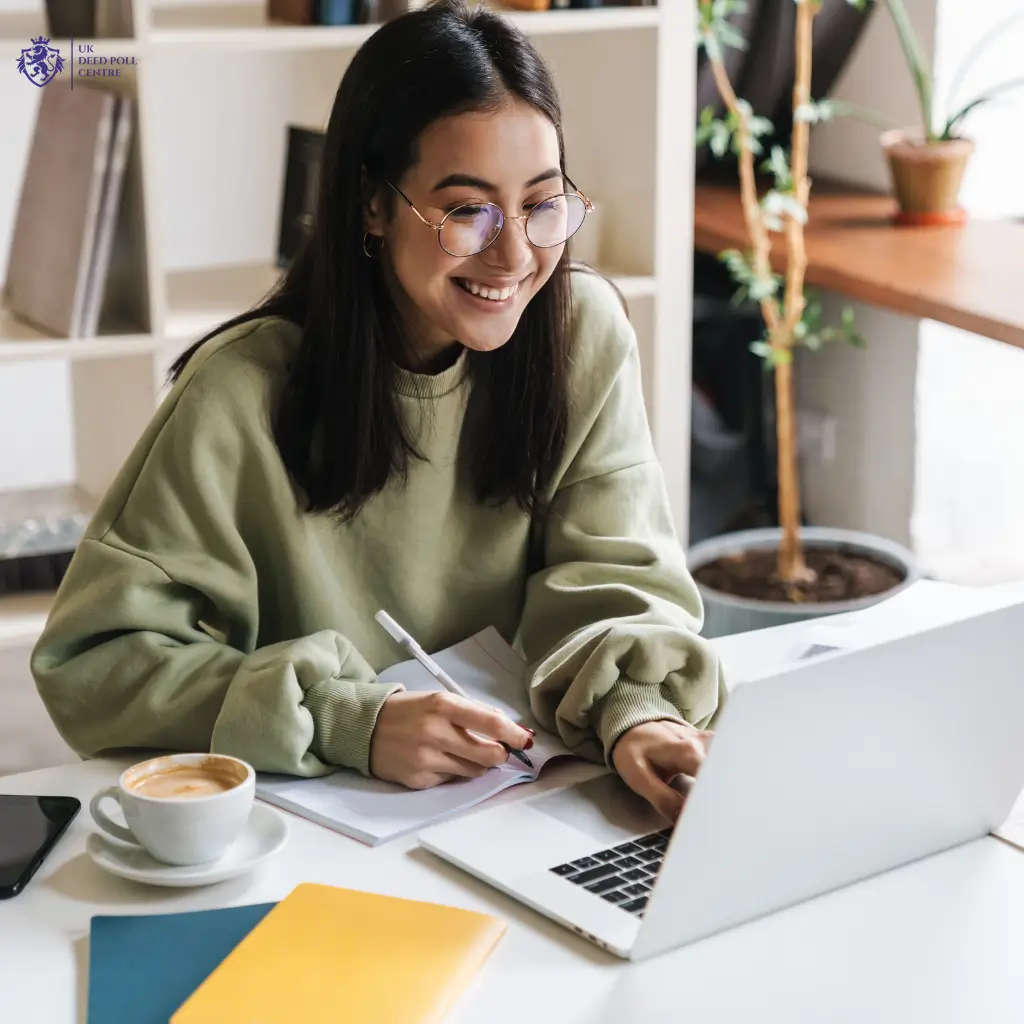 A happy lady completing her deed poll name change online through the UK Deed Poll Centre.